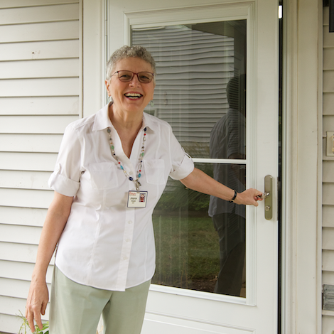 resident in front of home