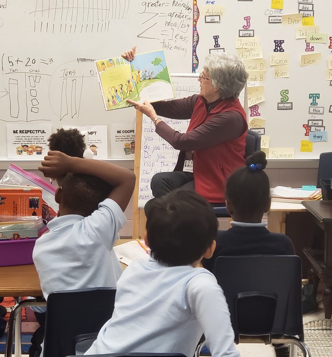 residents reads to students