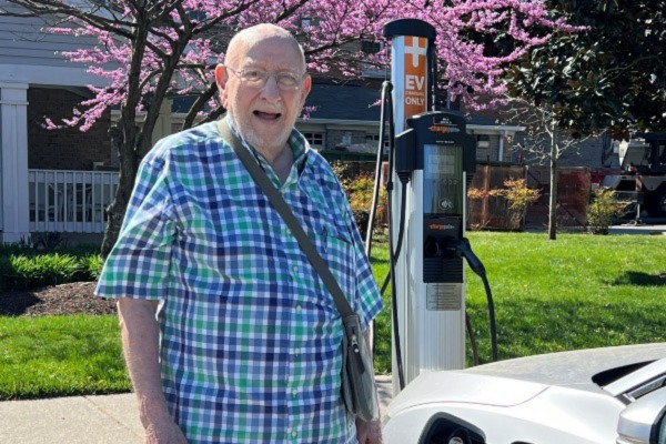 resident using charging station
