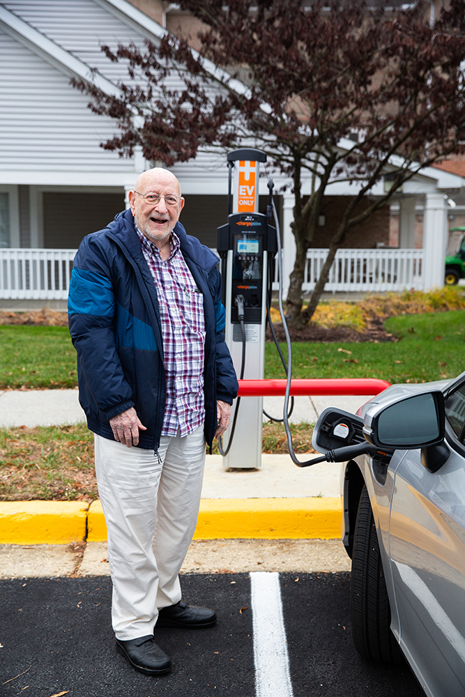 resident charges electric car